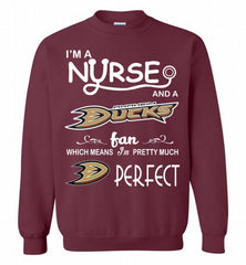 I'M A Nurse And A Anaheim Ducks Fans Gift Crewneck Sweatshirt - zezetee I'M A Nurse And A Anaheim Ducks Fans Gift Crewneck Sweatshirt - zezetee